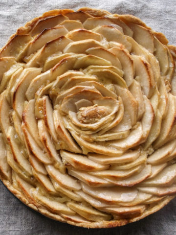 Browned apple tart with apples arranged in spirals