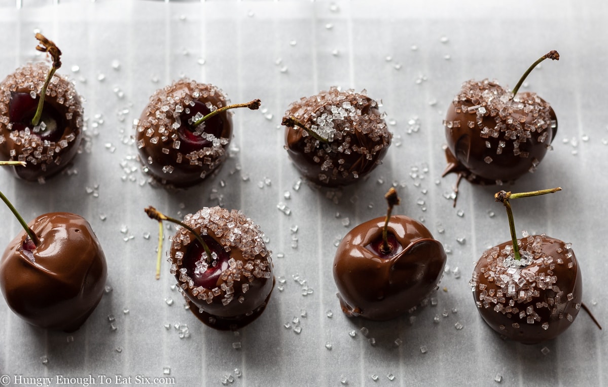 Chocolate dipped cherries, some with sugar.