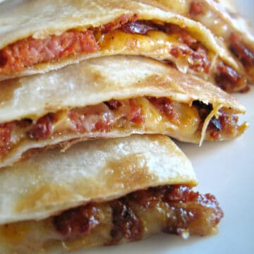 Meat and cheese quesadillas slices.
