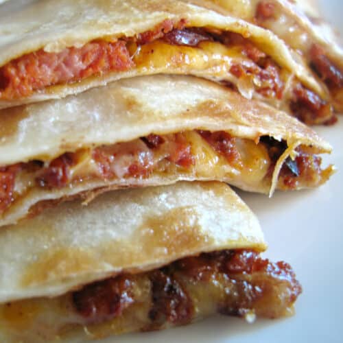 Meat and cheese quesadillas slices.