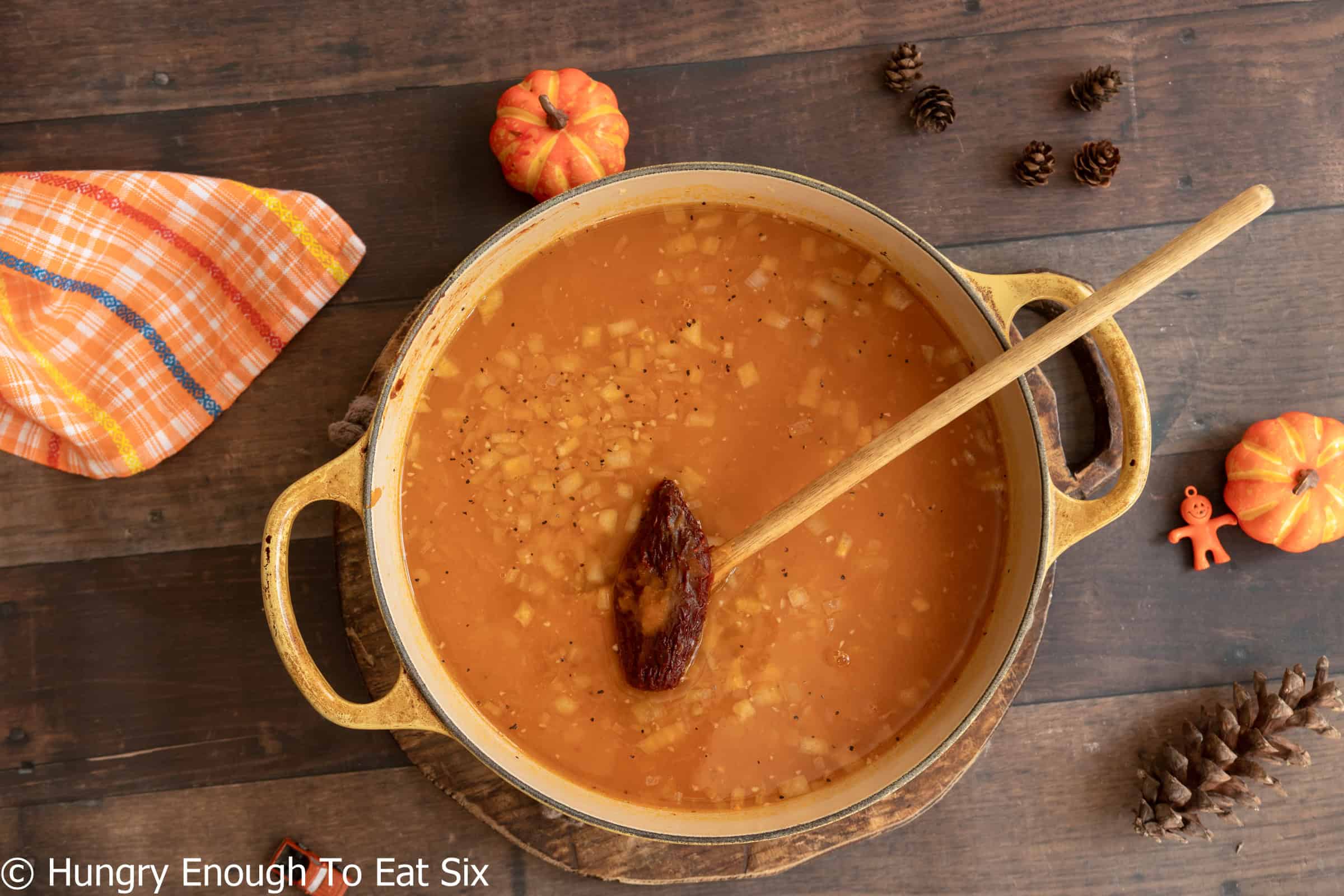 Pumpkin soup ingredients in a large pot.
