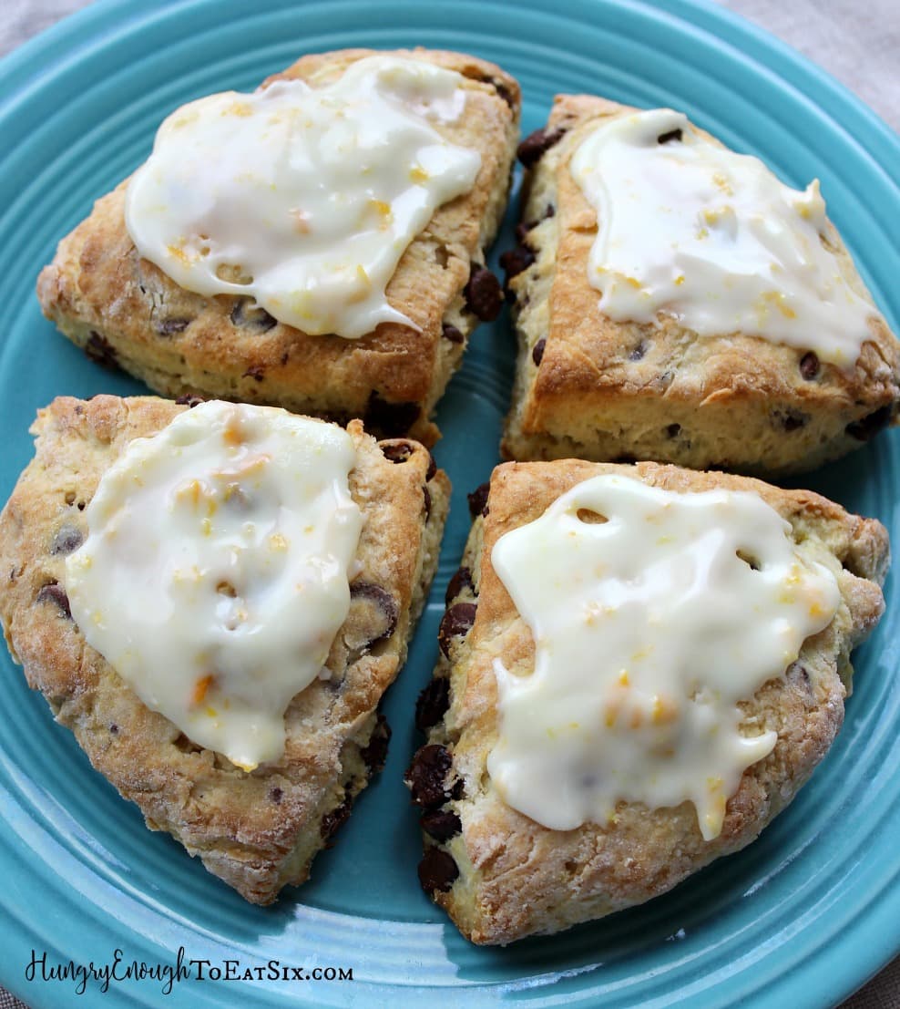 Glazed baked scones on a blue plate