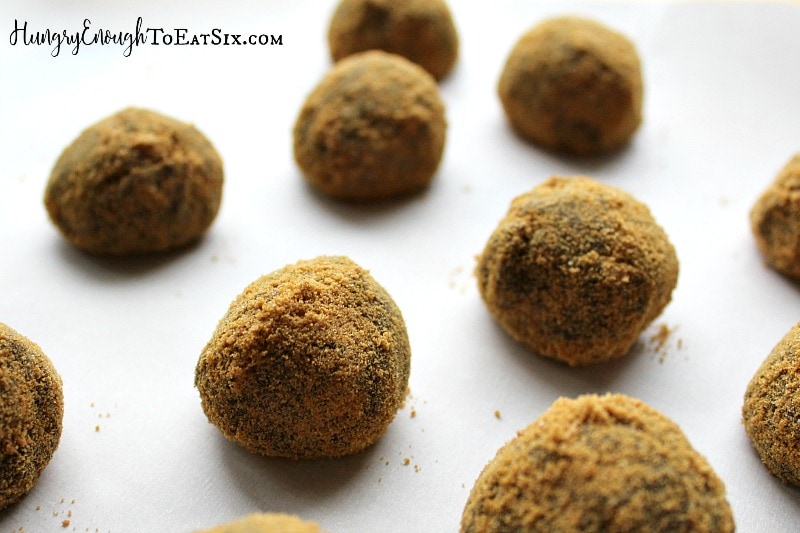 Rich, dark truffles are coated in fine gingersnap cookies crumbs. It's a sumptuous treat!