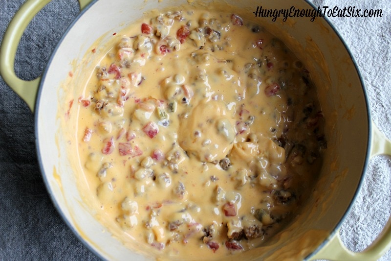 Cheese sauce with tomatoes