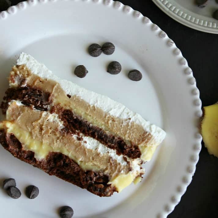 Layered dessert of chocolate, peanut butter, and whipped cream