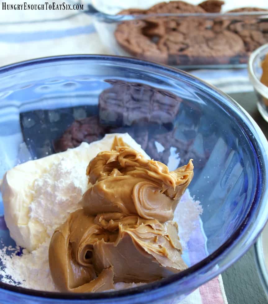 Peanut butter, cream cheese and sugar in a bowl.