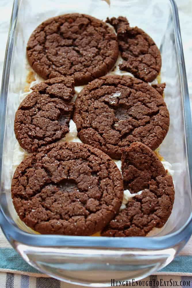 Chocolate cookie pieces in a glass pan.
