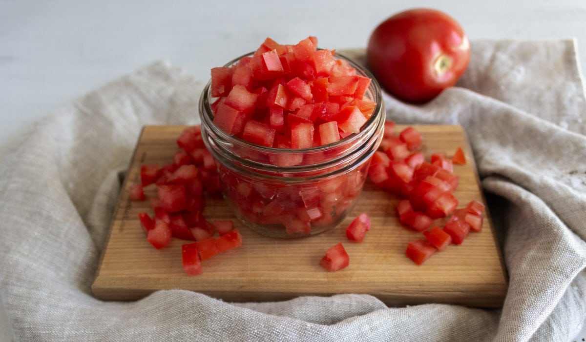 Glass dish of diced tomatoes