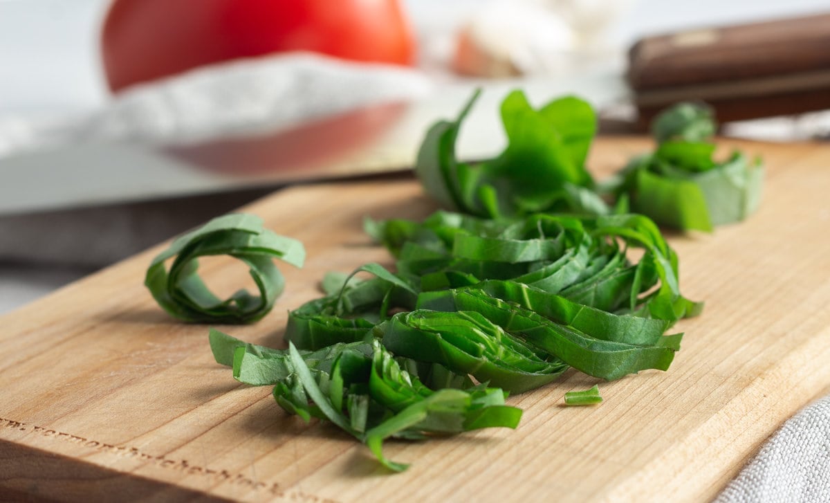 Ribbons of sliced basil leaves