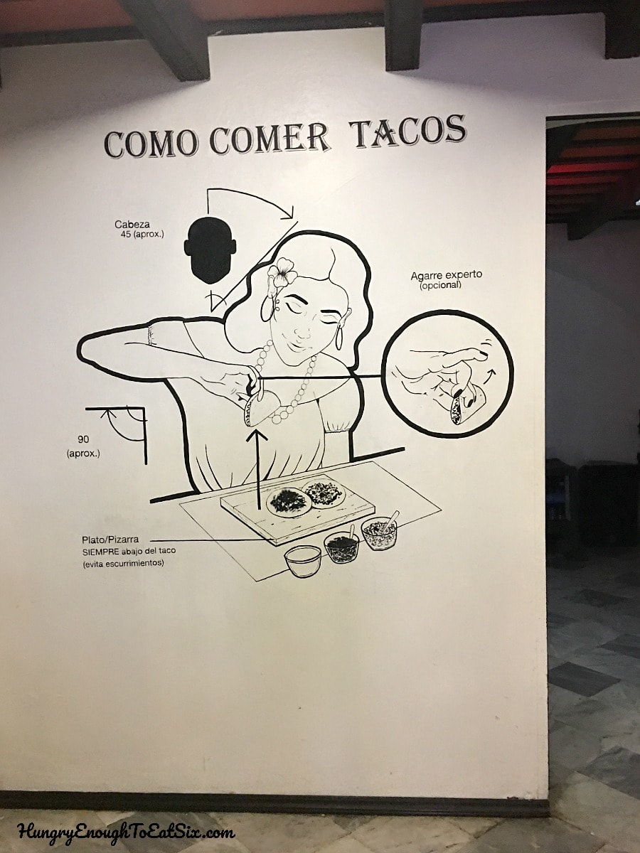 Illustration of woman eating a taco