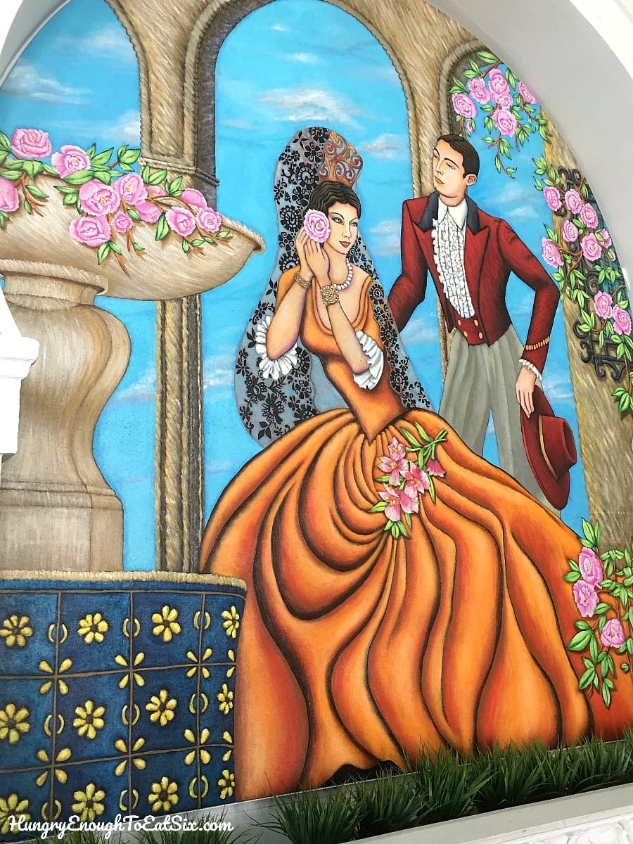 Mural of woman in orange dress