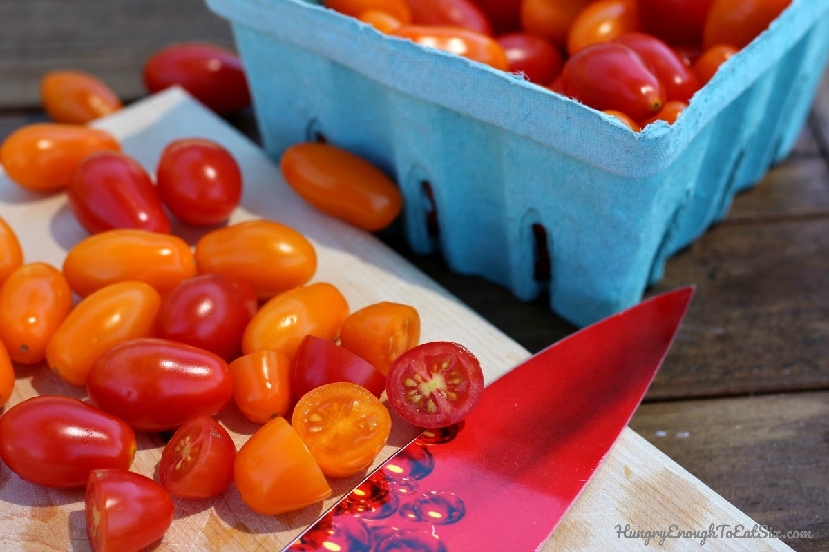 Cherry tomatoes on a cutting board