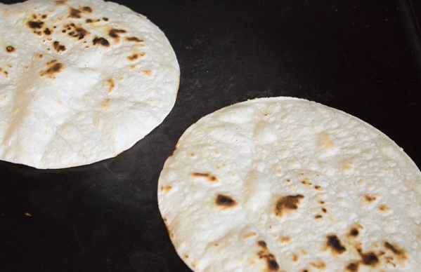 Tortillas toasting in a griddle