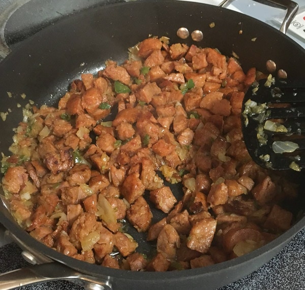 Taco filling cooking in a pan