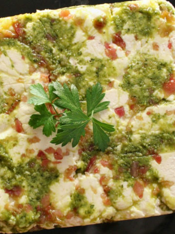 Sqaure of cheese and pesto spread
