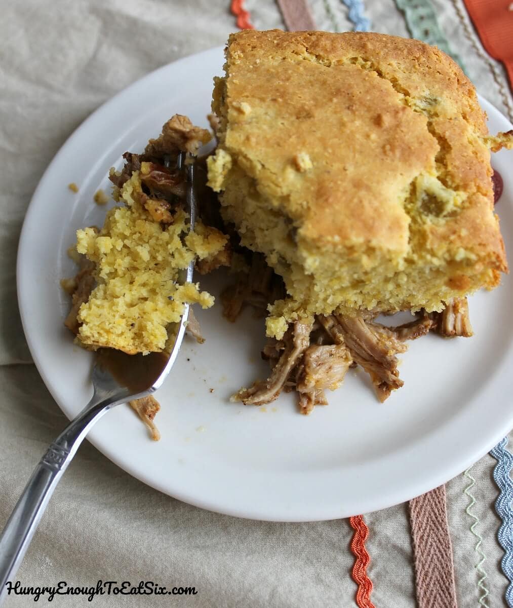 A savory, spicy supper pie with shredded pork and cornbread!