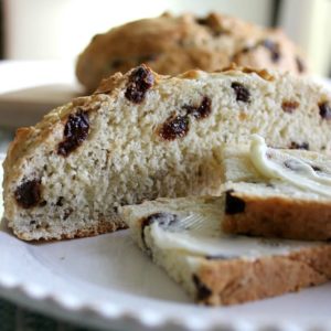 Image of Aunt Lizzie'ss Irish Soda Bread slices spread with butter.