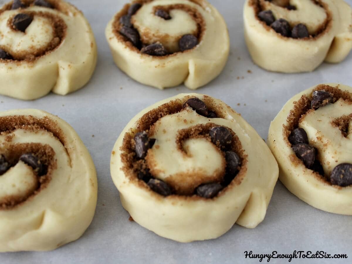 Hot from the oven, the chocolate chips are gooey through the swirl in the cinnamon rolls. 