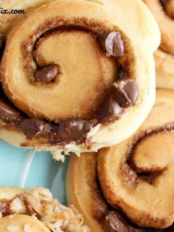 Hot from the oven, the chocolate chips are gooey through the swirl in the cinnamon rolls.