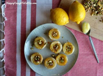 The pastry cups are full of bright, citrusy lemon curd and topped with salty pistachios!