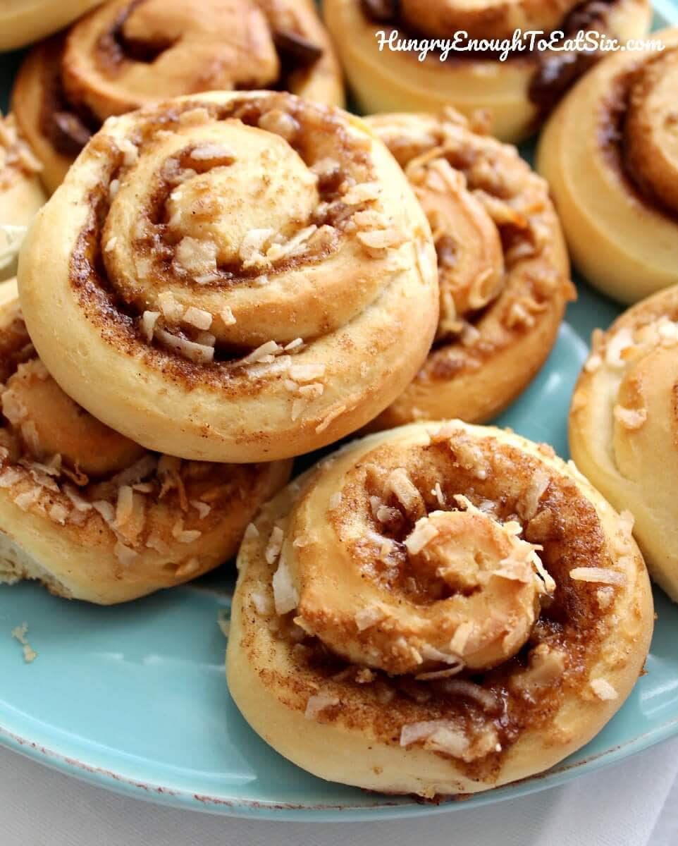 The flavors in the sweet buns are delectable together, with coconut bringing a soft chewiness and the toffee a bit of crunch. And a sweet, simple glaze over the top. Have these on hand for your midday cup of coffee or tea, and do not be afraid to truck them out at breakfast!