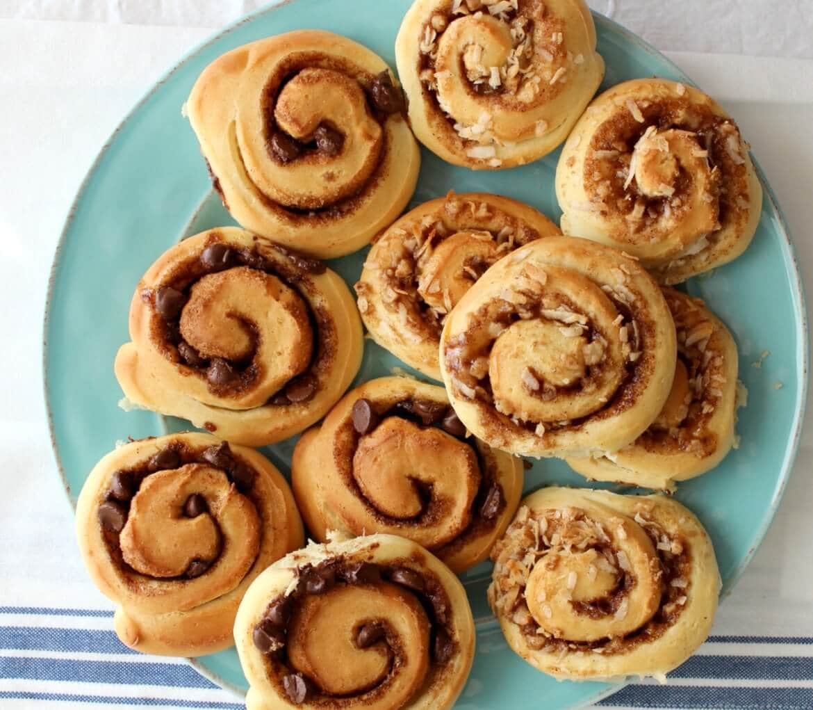 The flavors in the sweet buns are delectable together, with coconut bringing a soft chewiness and the toffee a bit of crunch. And a sweet, simple glaze over the top. Have these on hand for your midday cup of coffee or tea, and do not be afraid to truck them out at breakfast!