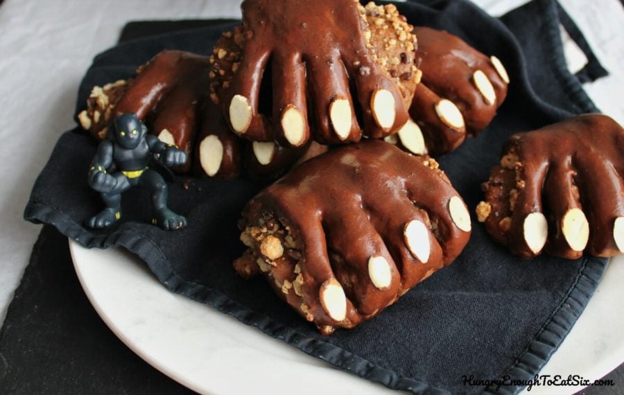 An homage to the Marvel movie 'Black Panther', these sweet chocolate rolls are filled with almond and chocolate, and decorated to look like black panther claws!