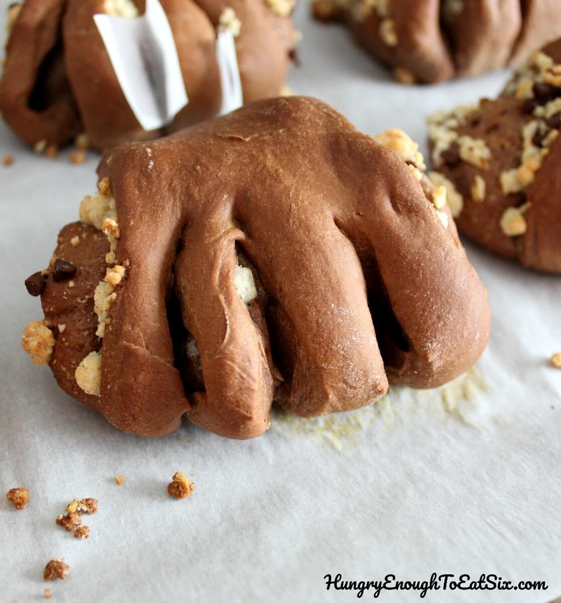 An homage to the Marvel movie 'Black Panther', these sweet chocolate rolls are filled with almond and chocolate, and decorated to look like black panther claws!