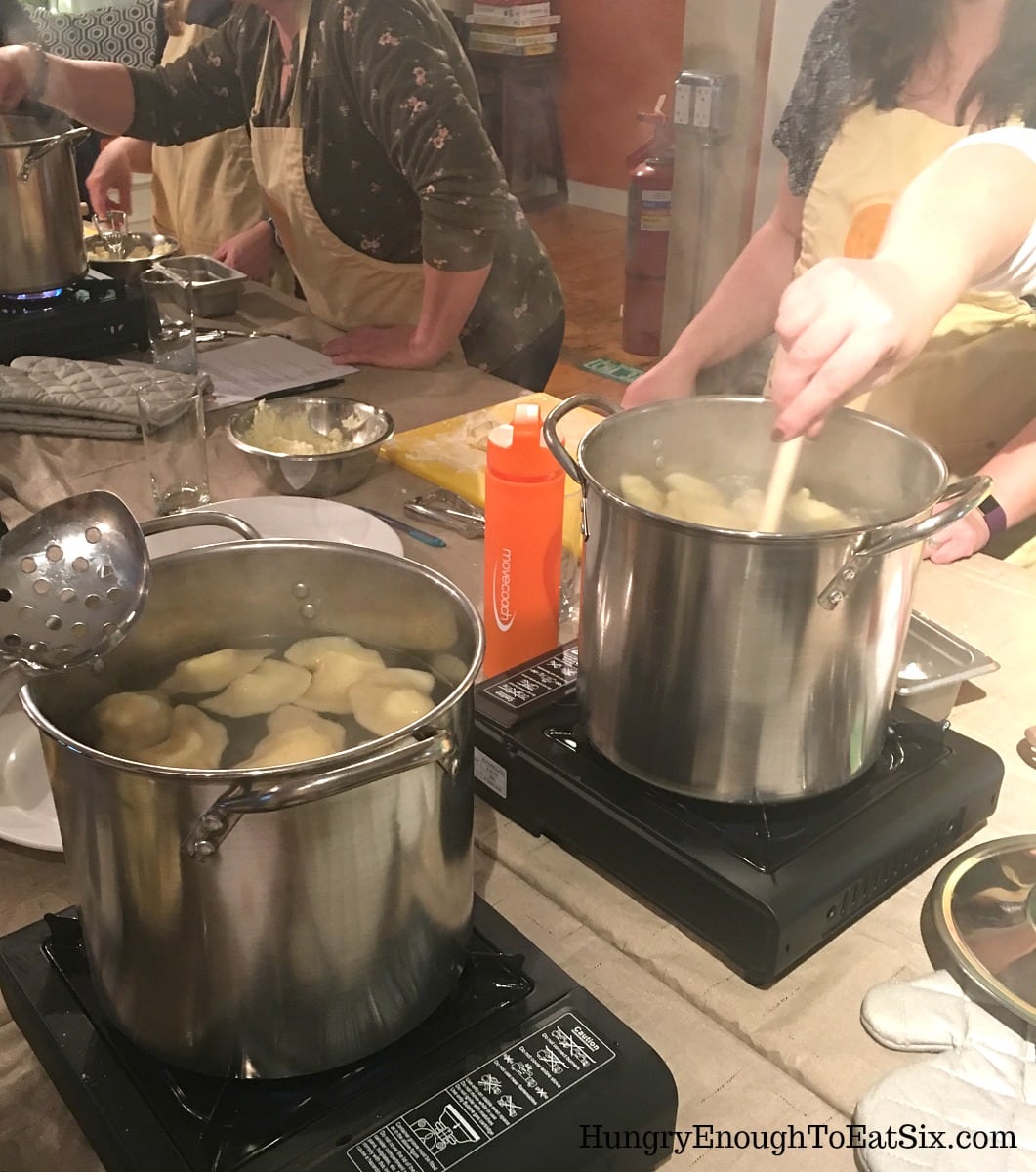 Pots at a cooking class with water