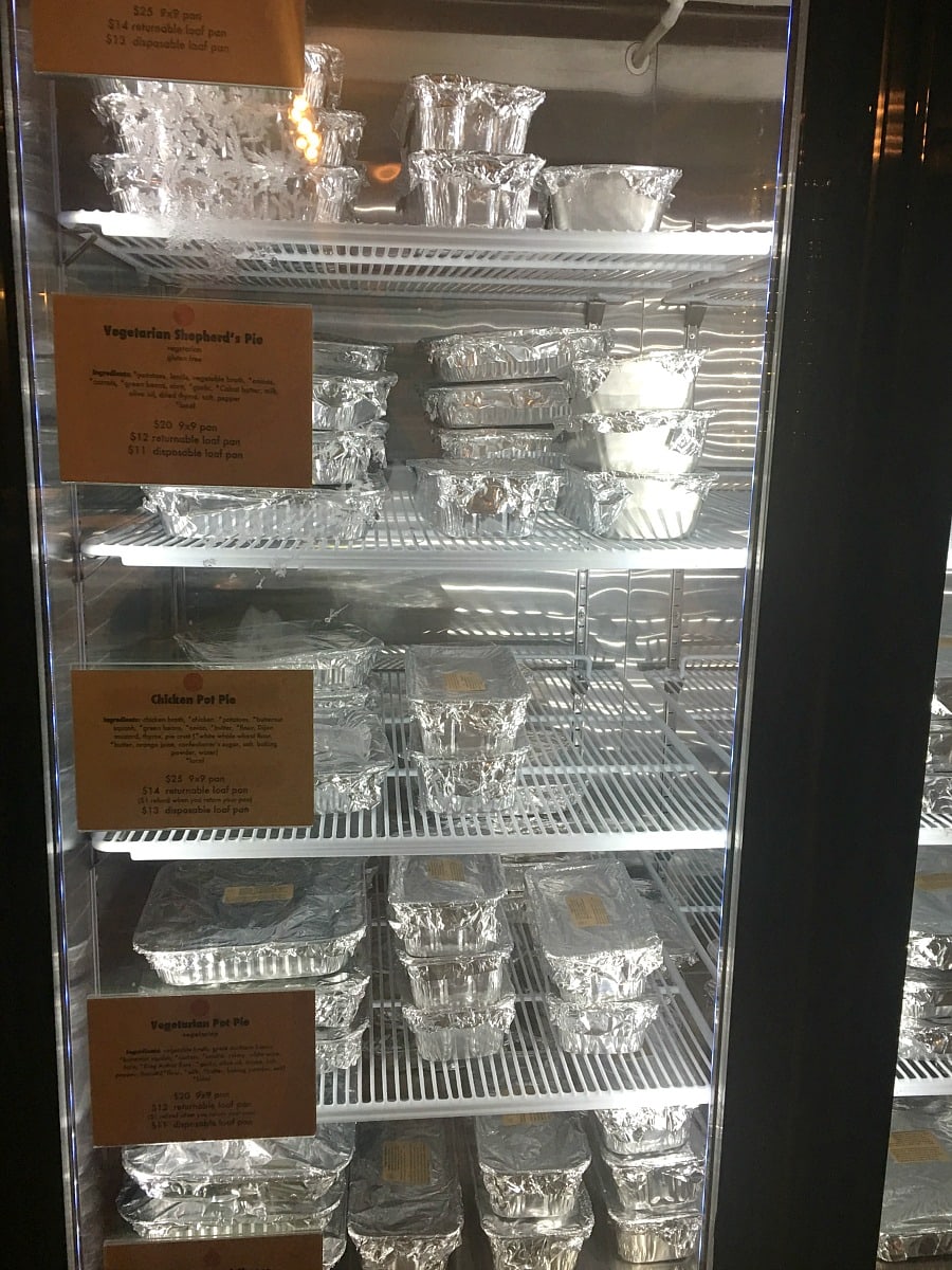 Cooler filled with foil wrapped meals