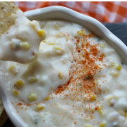 White queso dip with corn and cheese.
