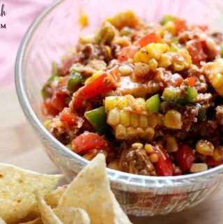 Image of Chopped Taco Salad in a glass bowl with Tortilla Chips