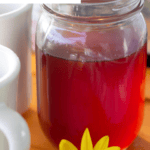Jar or orangey brown syrup