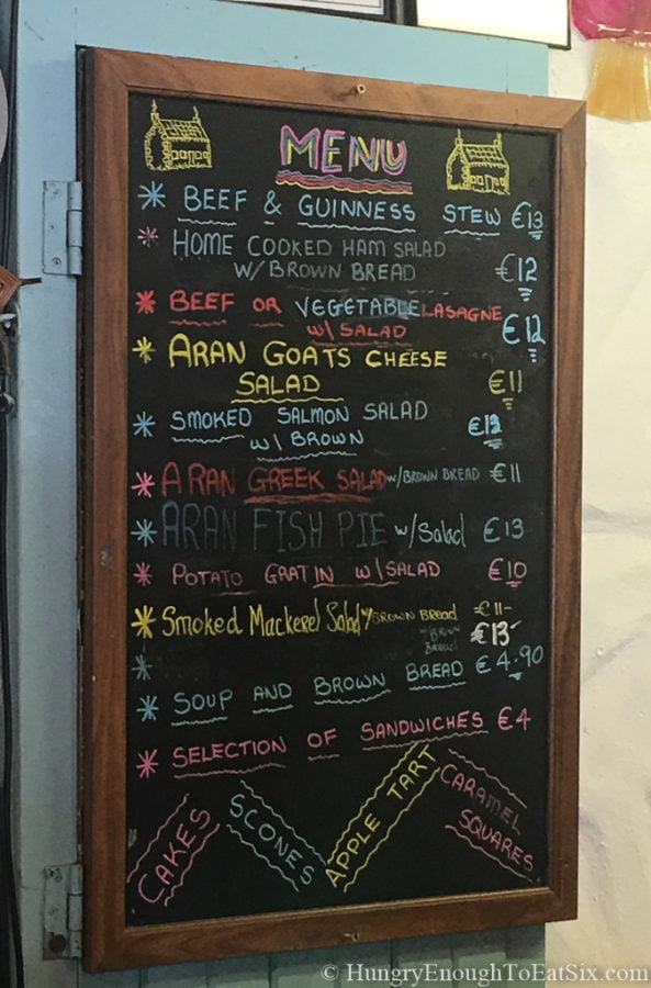 Chalkboard menu with different colors of writing. 