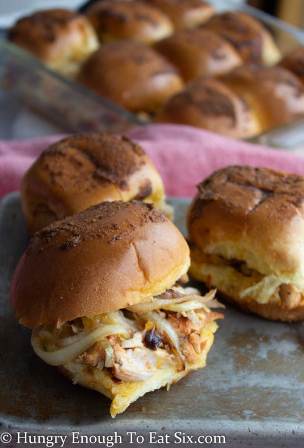 Slider sandwiches with meat and cheese.