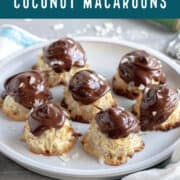 Plate of chocolate topped macaroons.
