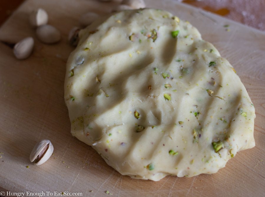 Cookie dough with chopped pistachios mixed in