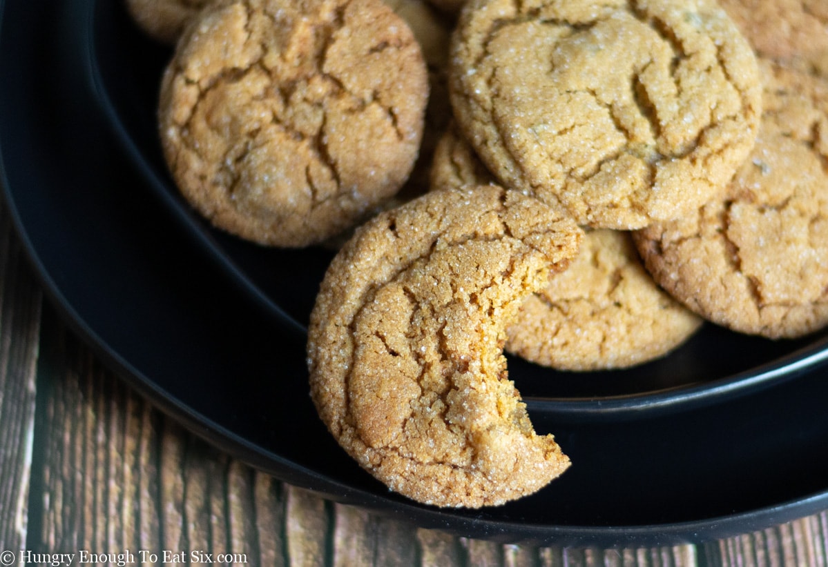 Ginger cookies and one cookie with a bite out of it