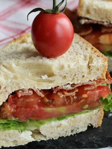 Bacon sandwich with tomatoes.