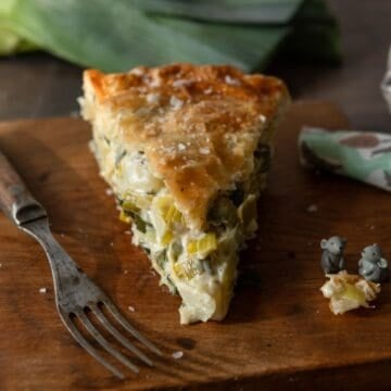 Slice of baked potato leek pie.