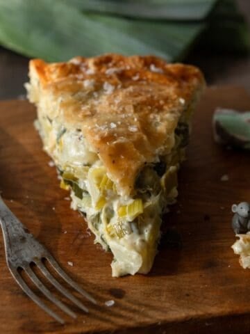Slice of baked potato leek pie.
