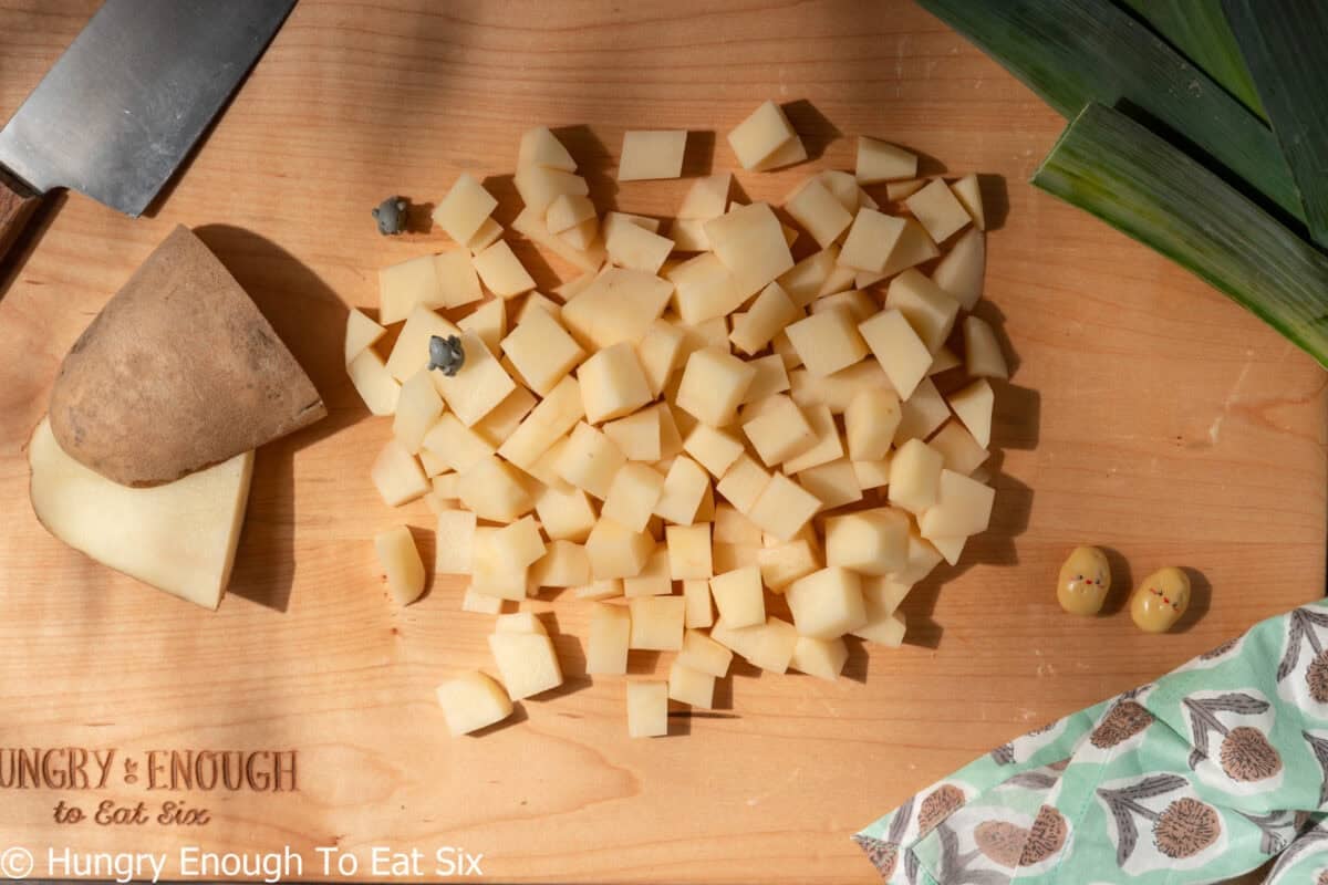 Diced russet potatoes prepped for boiling and folding into a leek and potato pie.