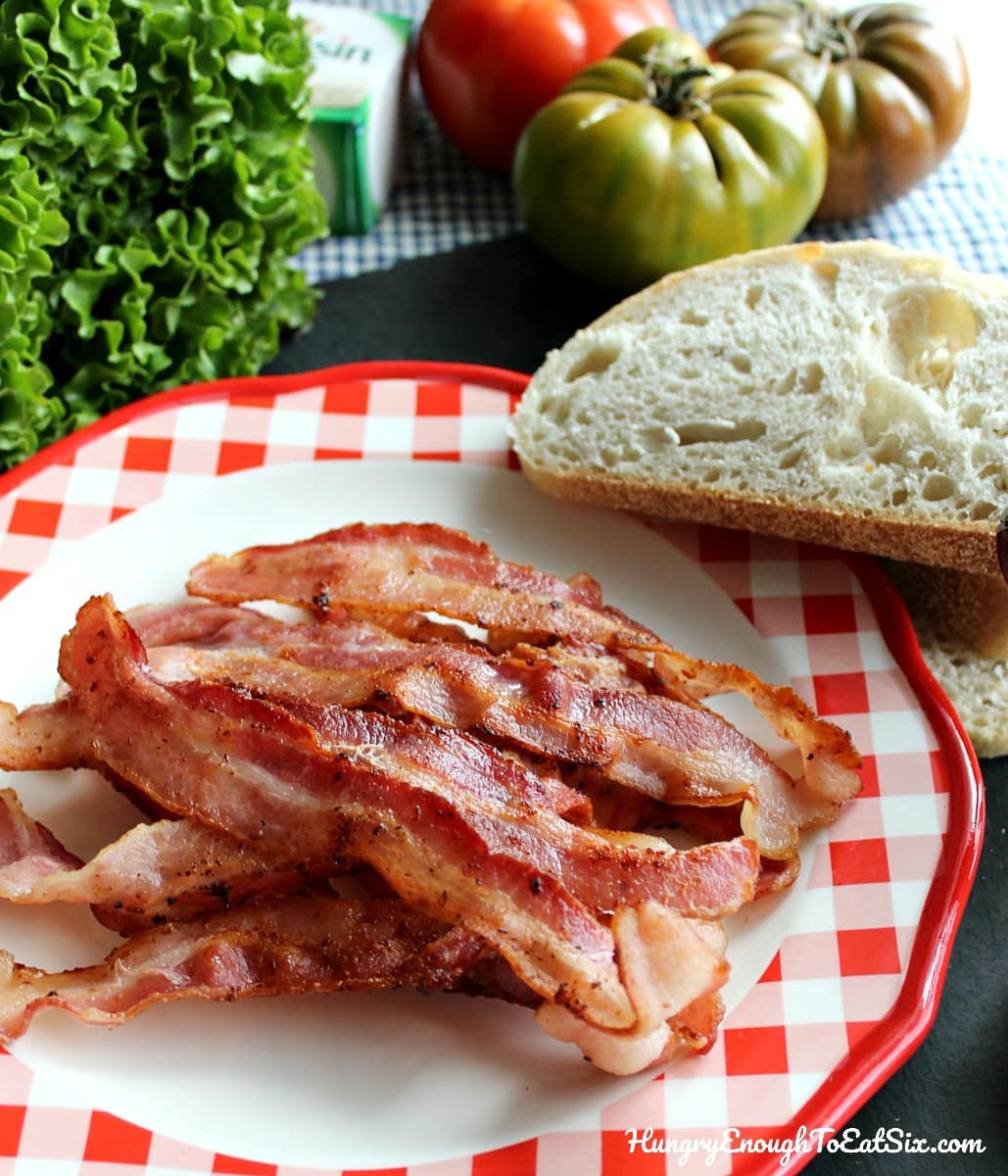 Cooked bacon and sliced bread