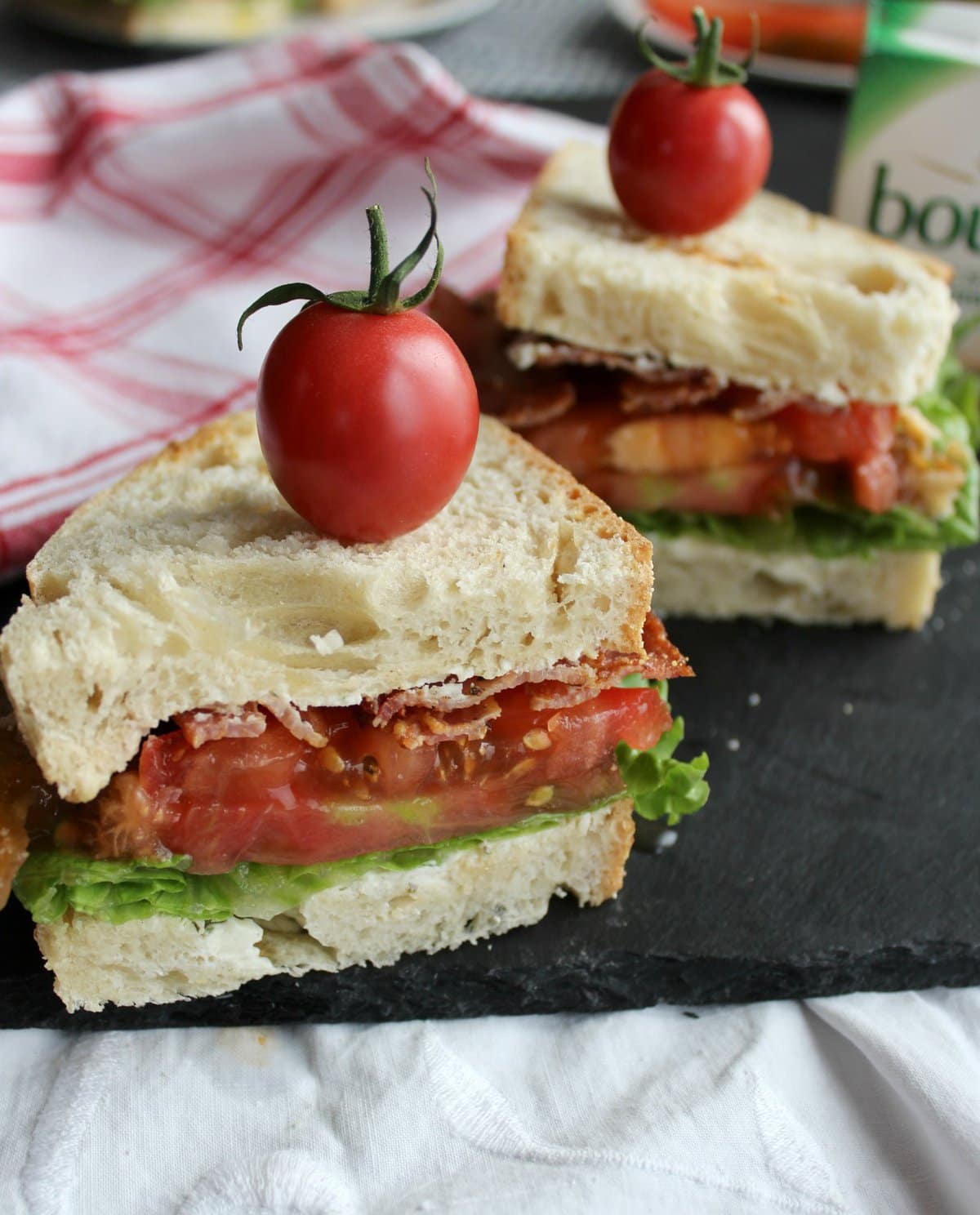 BLT sandwich on a slate board