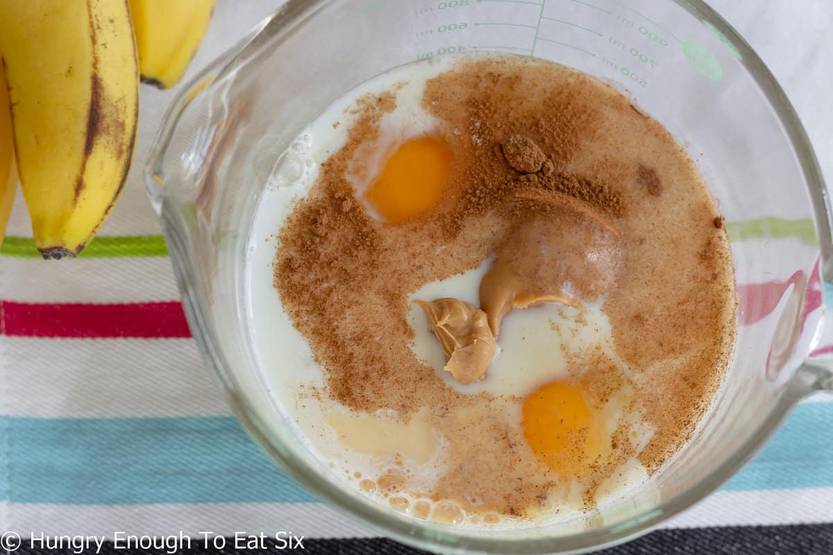 Mixing bowl with ,milk-eggs-cinnamon mixture.