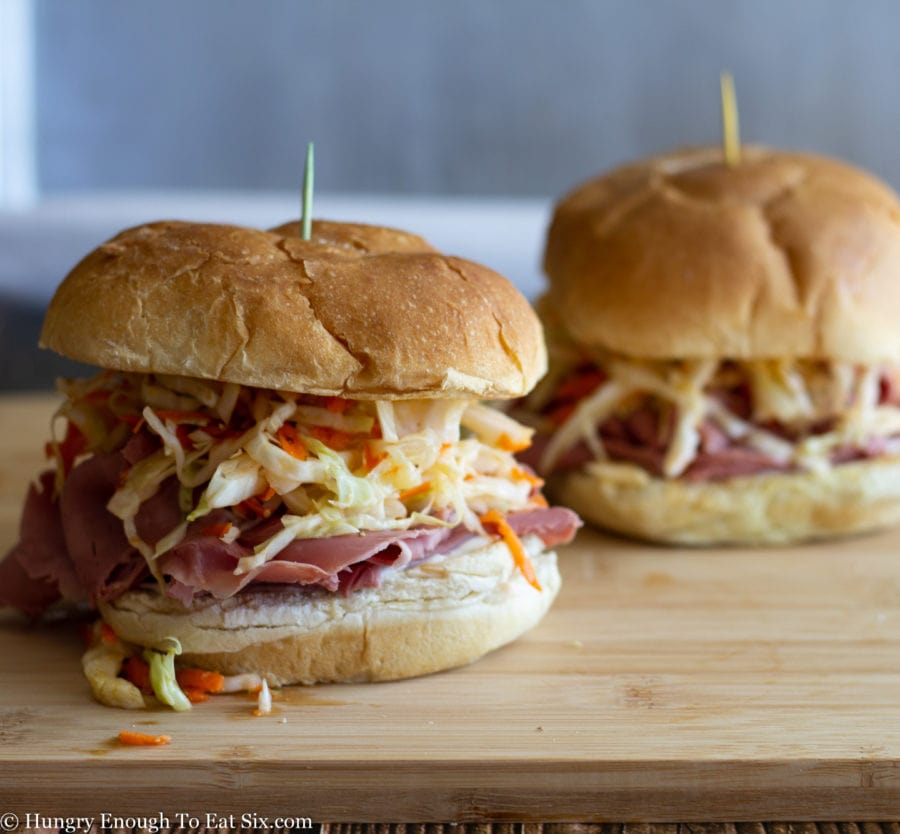 Two corned beef and slaw sandwiches.