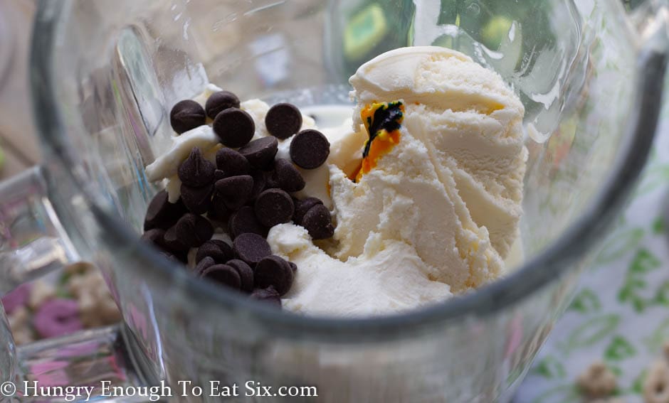 ice cream and chocolate in a glass blender