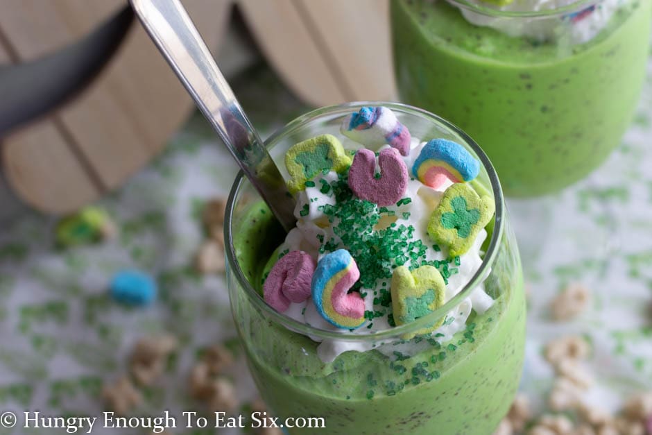 Colorful marshmallows on a green milkshake