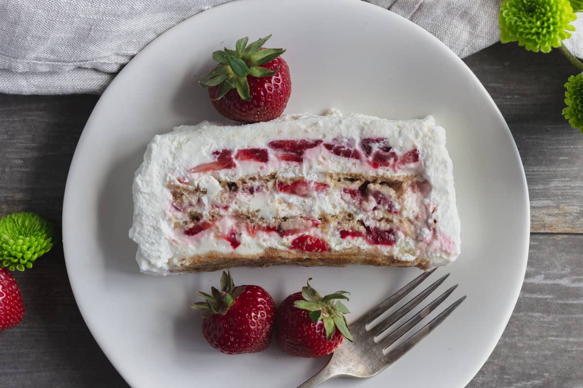 rectangular slice of icebox cake with strawberries