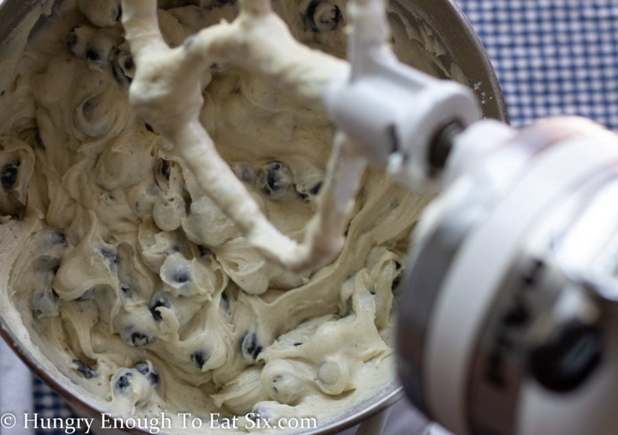 Blueberry coffee cake batter in the bowl of a stand mixer.